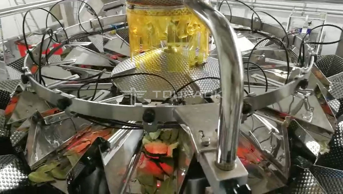 Máquina de embalaje de pesaje vertical totalmente automática para hojas de té secas hoja de bahía con 14 pesadores multicabeza