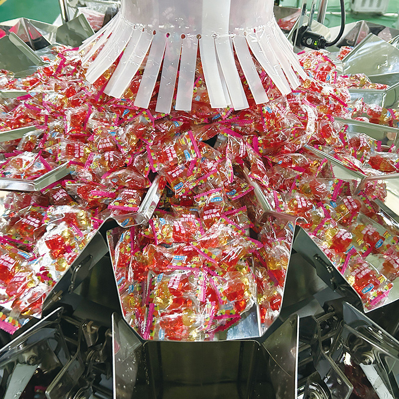 Máquina de embalaje vertical de nueces de pistacho de alta eficiencia con accionamiento por PLC para sellar, envolver, etiquetar, llenar y envasar