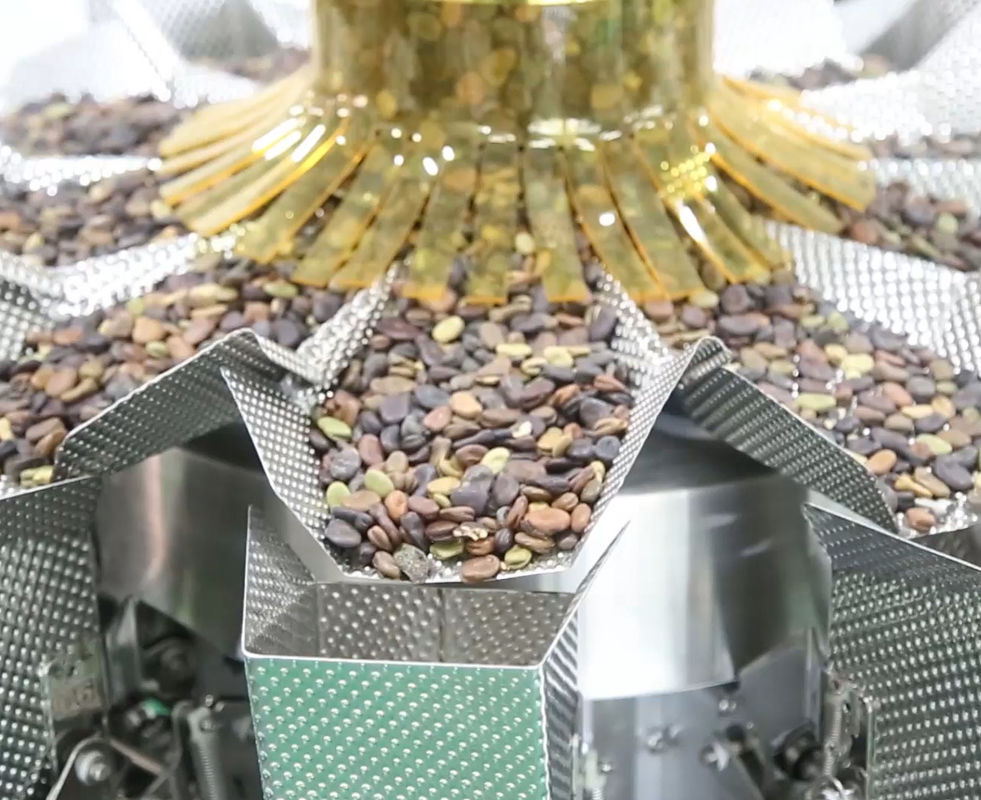 14 tipo elevador del cuenco de la empaquetadora del pesador VFFS de Mutihead para el chocolate Bean Frozen Fruits