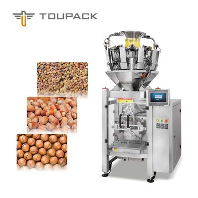 todos en un chocolate de pesaje y que embala trabajan a máquina el embalaje de los snacks