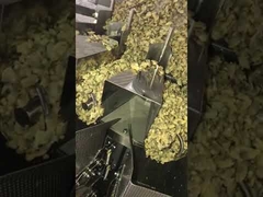 Sistema de llenado automático de latas de alimentos cocidos